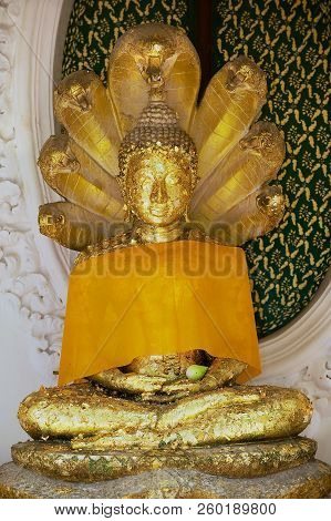 Nakhon Pathom, Thailand - April 09, 2012: Gold Covered Buddha Statue At The Phra Pathon Chedi In Nak