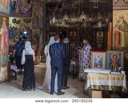 Tiberias, Israel, September 22, 2018 : A Priest Reads A Prayer At The Wedding Ceremony Held In The O