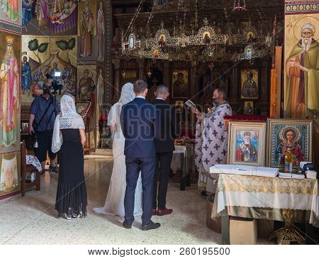 Tiberias, Israel, September 22, 2018 : A Priest Reads A Prayer At The Wedding Ceremony Held In The O