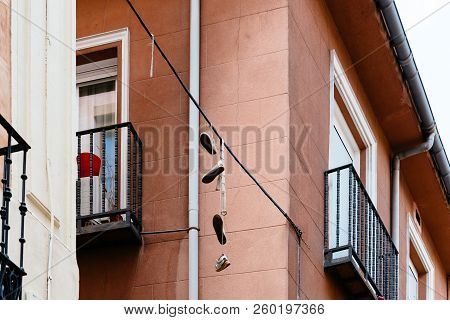 Shoes Hanging On Wire In Lavapies In Madrid