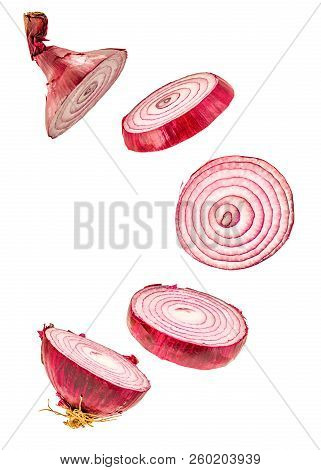 Slices Red Onion Flying Isolatedon White With Clippingpath. Crative Flying Vegetable