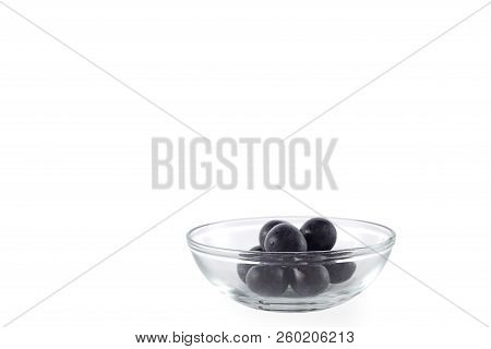 Fresh Black Grapes On White