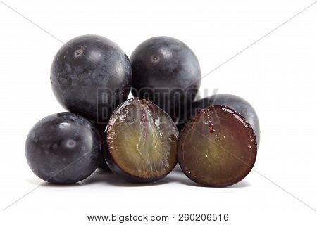 Fresh Black Grapes On White