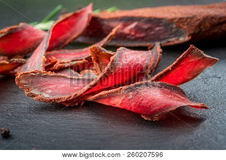 Armenian Basturma. Beef Cured And Spice. Organic Products On A Wooden Table