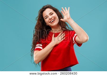 Argue, Arguing Concept. Beautiful Female Half-length Portrait Isolated On Blue Studio Backgroud. You