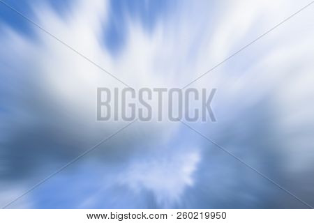 Nimbus Clouds Or Monsoon Clouds Or Rain Clouds In The Blue Sky Shot With Motion Blur Effect.