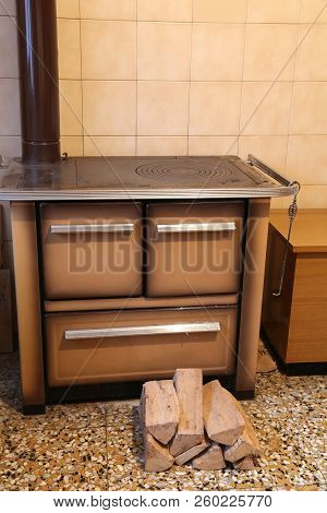 Very Old Wood-burning Stove Inside The Kitchen Of The Home In Mountain