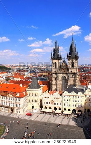 Famous Tyn Church on Old Town Square, Prague, Czech Republic. View from Tower with astronomical clock