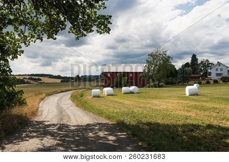 Rural Scene Haystacks And Buildings, Hamar, Hedmark, Norway