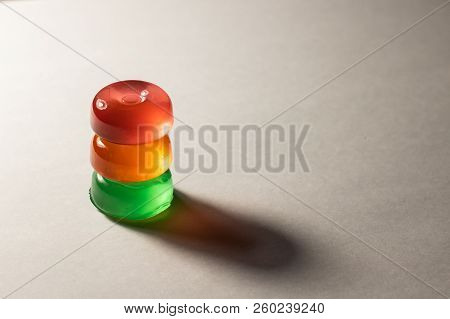 Three Clorfull Lollipops On A White Background