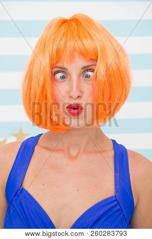 Crazy Girl With Orange Hair. Crazy Emotions On Face Of Girl. Feelings And Emotions Concept. Crazy Ey