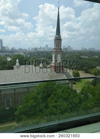 Clowdie Blue Skies Over Skyline And Church