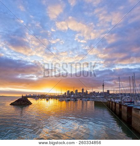 Auckland Skyline And Westhaven Marina At Sunrise. All Names And Logos Removed.