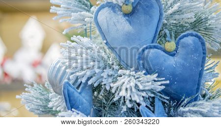 Decorative Snow-covered Christmas Tree Decorated With Decorative