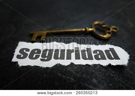 Seguridad (security) News Message With Gold Key