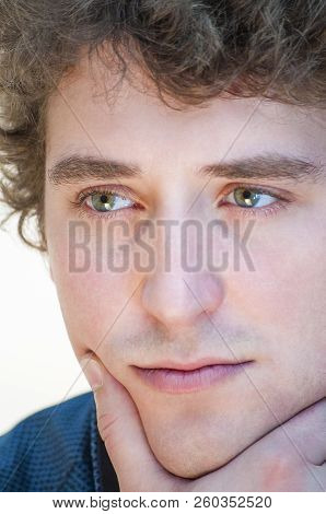 Portrait Of Young Caucasian Ethnicity Pensive Thoughtful Man Propped His Head On His Hand On White B