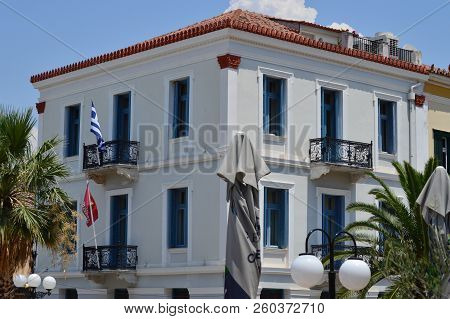 Typical White Building With Blue Sales In Nafplio. Architecture, Travel, Landscapes, Cruises. July 8, 2018. Nauplion Argolida Greece.