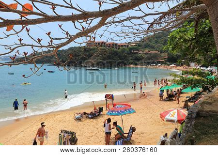 Buzios, Brazil - October 16, 2014: People Visit Joao Fernando Beach In Buzios, State Of Rio De Janei