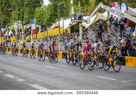 Paris, France - July 23, 2017: Group Of Cyclists On Avenue Des Champs-elysees For The Final Stage Of