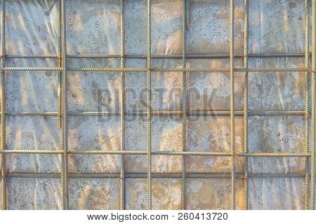 Abstract Background Of Iron Armature Ready For Concreting Metal Armature In Reinforced Concrete Stru