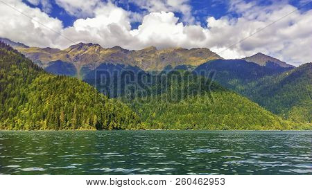 Beautiful Mountain Lake Ritsa. Lake Ritsa In The Caucasus Mountains, In The North-western Part Of Ab