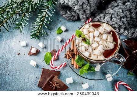 Homemade Hot Chocolate With Mint, Candy Cane And Marshmallow, Light Blue Background With Warm Blanke