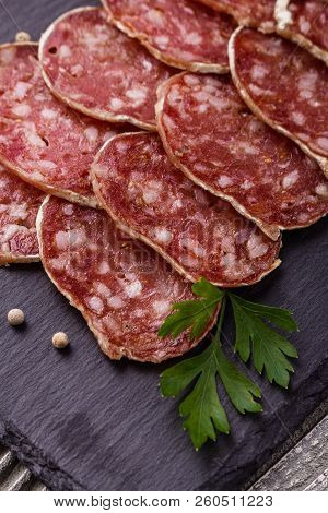 Saucisson Sec Delicious French Salami On A Wooden Background