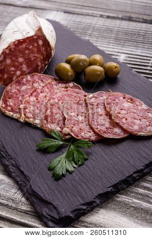 Saucisson Sec Delicious French Salami On A Wooden Background