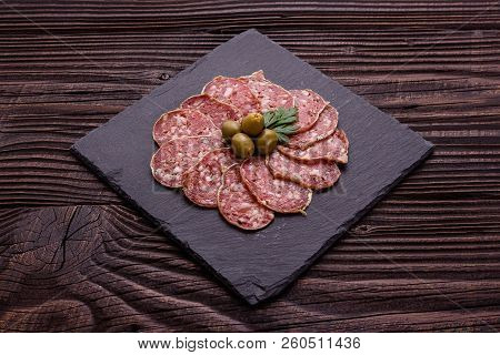 Saucisson Sec Delicious French Salami On A Wooden Background
