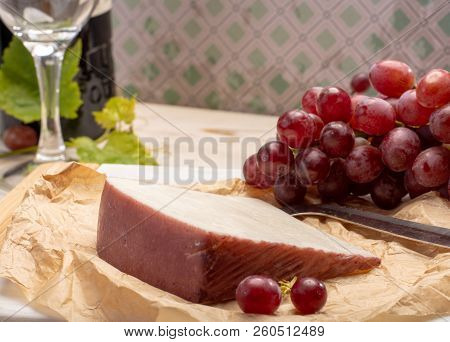 Traditional Spanish Cheese, Murcian Wine Cheese From Goat Milk With Rind Washed In Red Wine, Served
