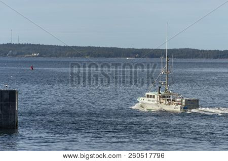 Bass Harbor, Maine, Usa - September 21, 2018: Lobster Boat Poseidon Heading Out Of Bass Harbor