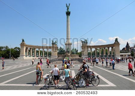 Budapest, Hungary - June 19, 2014: People Visit Heroes Square In Budapest. It Is The Largest City In