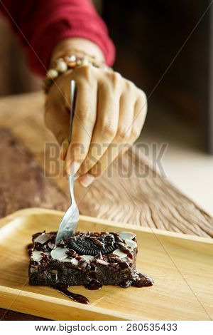 Women Are Using Cutlery, Toasted Bread, Brownies.