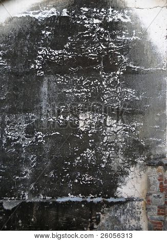 una fuoco danneggiato bruciato parete