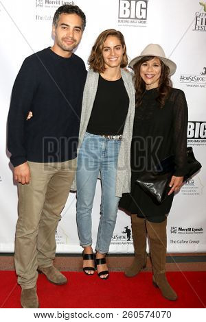 LOS ANGELES - SEP 26:  Ramon Rodriguez, Karina Silva, Rosie Perez at the Catalina Film Festival - Opening Night at the Art Theater on September 26, 2018 in Long Beach, CA