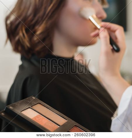 Closeup Of Professionsl Makeup Artist Applying Eyeshadows With Brush