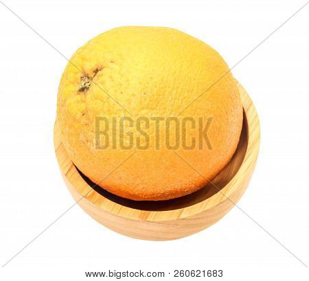 Closeup Of One Orange Sunkist On Wooden