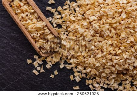 Fragrant Dried Parsnip On A Dark Stone Background