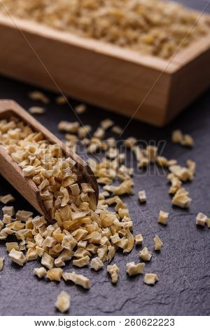 Fragrant Dried Parsnip On A Dark Stone Background
