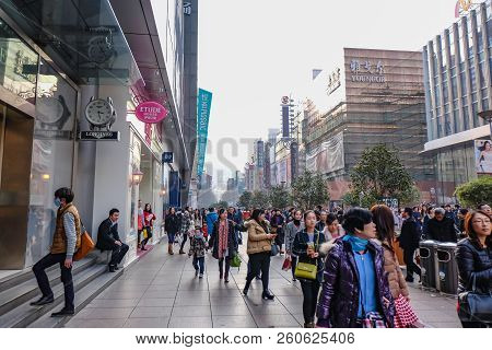 Shanghai/china -  January 24 2015: People Walking In Nanjing Road Walking Street In Shang Hai City C