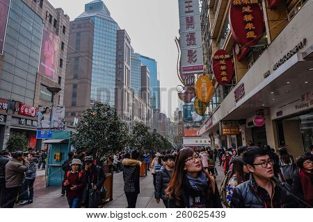 Shanghai/china -  January 24 2015: People Walking In Nanjing Road Walking Street In Shang Hai City C