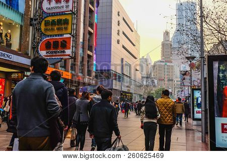 Shanghai/china -  January 24 2015: People Walking In Nanjing Road Walking Street In Shang Hai City C