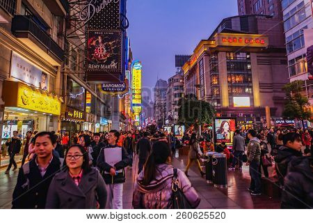 Shanghai/china -  January 24 2015: Night Life Of People Walking In Nanjing Road Walking Street In Sh