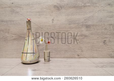 Summer Creative Still Life In Minimal Style. White And Pink Marguerite Daisy Flowers In Vintage Pear