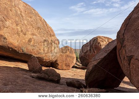 Devils Marbles Are Huge Granite Boulders Scattered Across A Wide, Shallow Valley, 100 Kilometers Sou