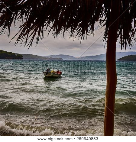 Boat On Sea Cloudy Day After Storm In Nydri On Lefkada