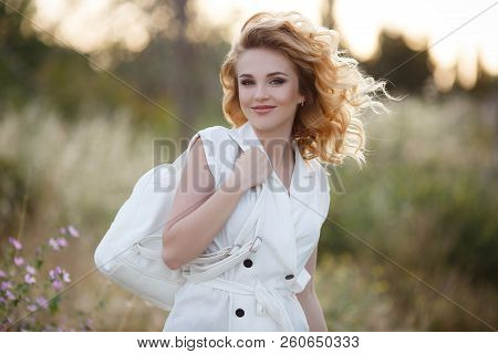 Beautiful Young Woman With Long Curly Hair, Blond, Long Black Eyelashes And Light Make-up, Cute Smil