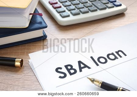 Sba Loan Form On An Office Table.