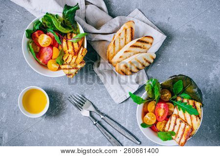 Cherry Tomato Salad With Grilled Haloumi Cheese, With Chard And Arugula