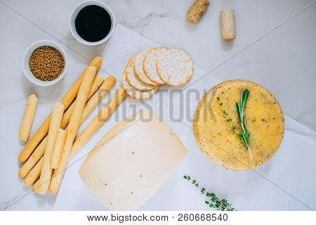Assorted ?achotta Cheese With Black Cumin, Fenugreek And Herbs With Jam, Baguette, Bread Sticks And 